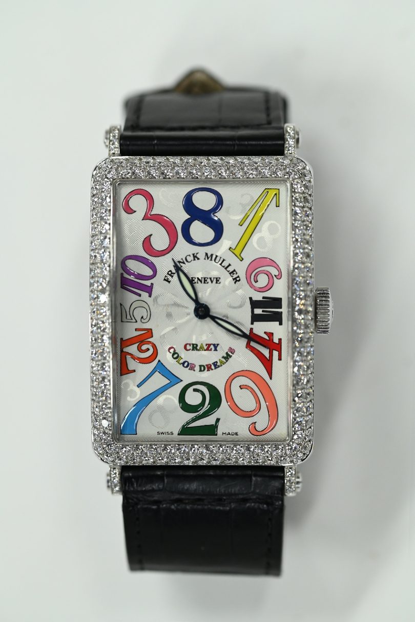 Franck Muller Long Island Crazy Colour Dreams with pavé diamond case and scattered multicoloured numerals on a guilloché silver dial