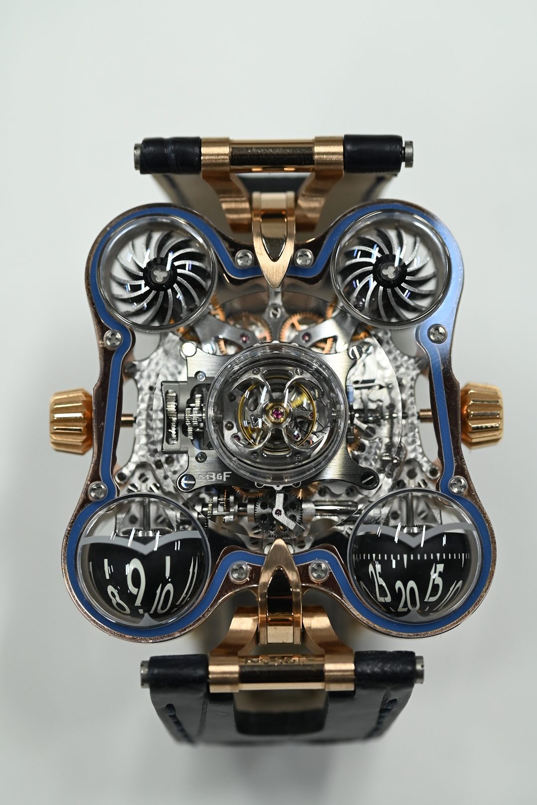 MB and F HM6 Space Pirate in red gold with blue accents, twin turbines, spherical hour and minute domes and a central flying tourbillon